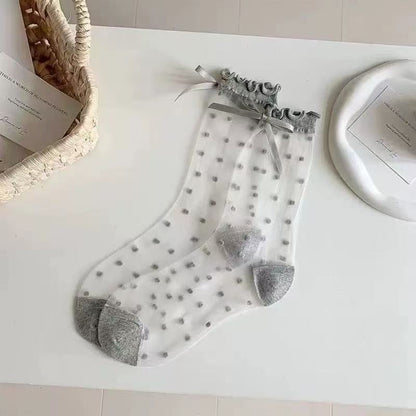 🧦 Officiell butik – Andningsbara strumpor i issilk med prickig design